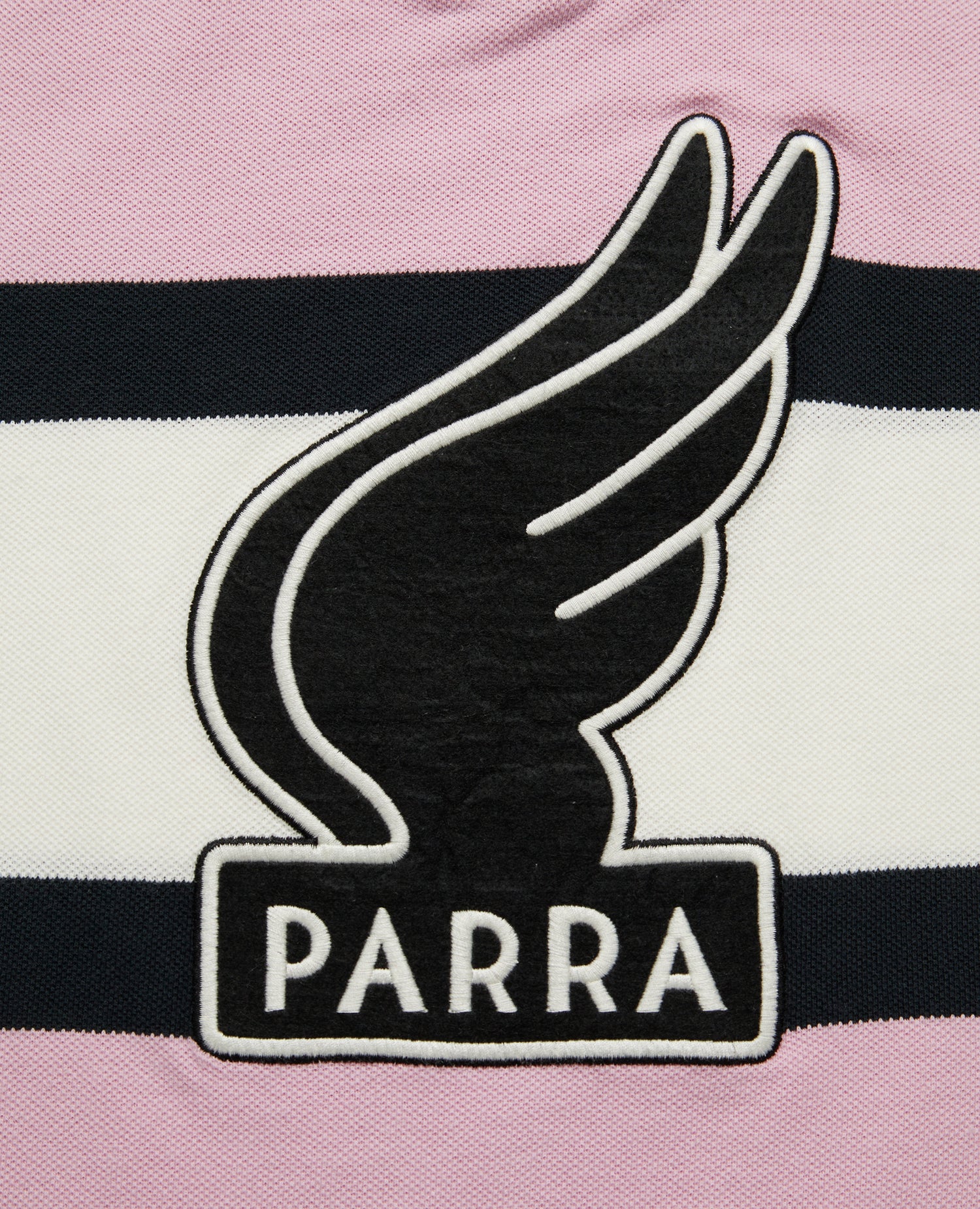 Polo byParra con logo alato (rosa/bianco sporco)