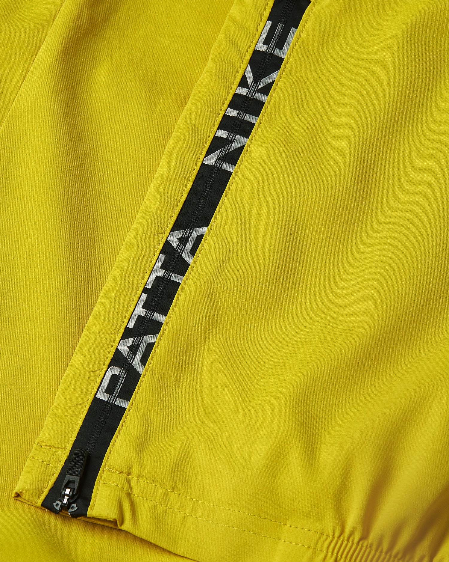 Nike x Patta Running Team Track Pants (Saffron Quartz)